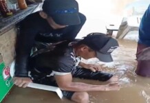 No Acre, igarapé transborda, inunda bar e clientes permanecem bebendo: “A pinga não para”